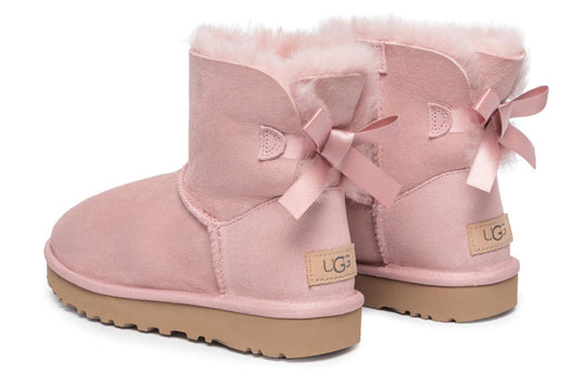 WMNS UGG Mini Baley Bow II Snow Boots Pink 1016501 PCRY