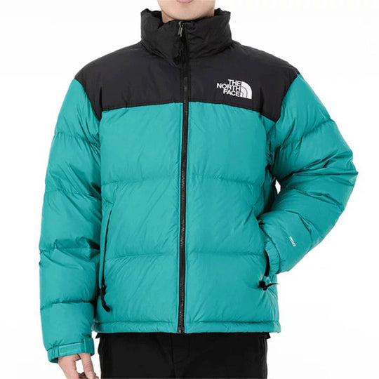 Shop The North Face 1996 Retro Nuptse Jacket NF0A3C8D-NYC green