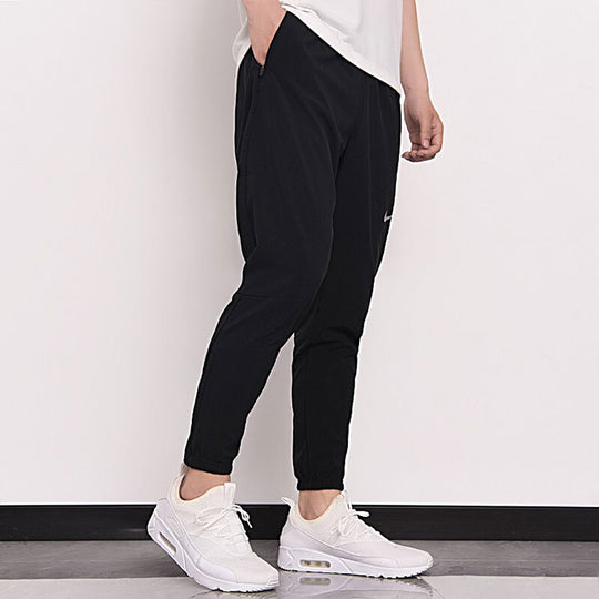 Nike Training Thin and light Breathable Woven Sports Pants Black DB411 ...